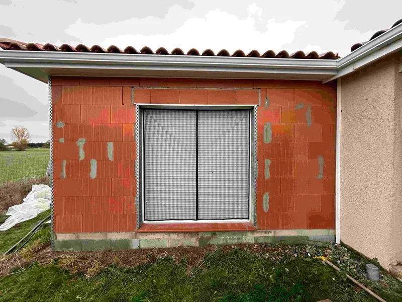 Enduit écrasé sur une maison à Colomiers après rénovation
